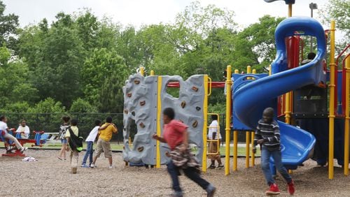 5/1/19 - Atlanta - Children play on the playground at Dobbs Elementary School in Atlanta, Georgia on Wednesday, May 1, 2019. EMILY HANEY / emily.haney@ajc.com