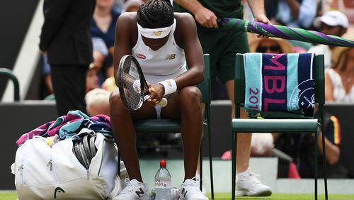 Cori Gauff hangs her head after her fourth-round loss to Simona Halep of Romania Monday, July 8, 2019, at Wimbledon championships in London.
