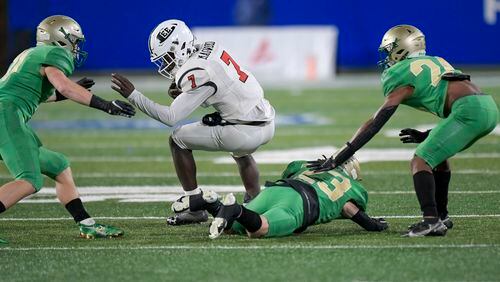 Lee County quarterback Chauncey Magwood (7) is brought down by Buford’s defense during the second half of their Class 6A state high school football final Tuesday, December 29, 2020 in Atlanta. (PHOTO/Daniel Varnado)
