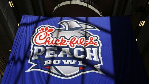 The new Chick-fil-A Peach Bowl logo is revealed at the Chick-fil-A corporate headquarters Monday, April 21, 2014, in Atlanta.