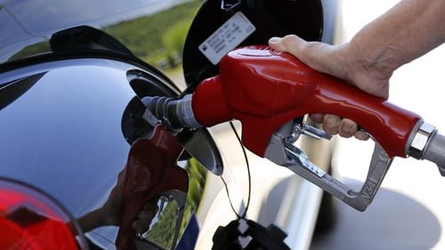Gassing up is a little more costly, thanks to Hurricane Harvey and the flooding it caused in Texas. (AJC file photo)