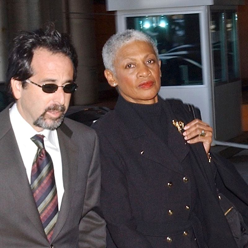 Morris Brown's former president Dolores Cross (rt) enters U.S. district court with Drew Findling in 2004. (T. LEVETTE BAGWELL / AJC file)