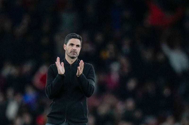 Arsenal's manager Mikel Arteta applauds at the end of the English Premier League soccer match between Arsenal and Chelsea at Emirates Stadium in London, Tuesday, April 23, 2024. (AP Photo/Kin Cheung)
