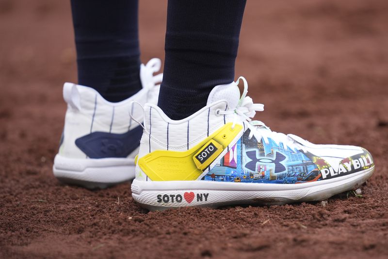New York Yankees' Juan Soto wears custom cleats during the fifth inning of the baseball game against the Toronto Blue Jays at Yankee Stadium Friday, April 5, 2024, in New York. (AP Photo/Seth Wenig)