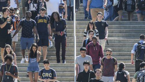 Atlanta: Georgia Tech students walk the stairs leading to the Tech Walkway on the first day of school on Monday, Aug. 21, 2017. JOHN SPINK/JSPINK@AJC.COM