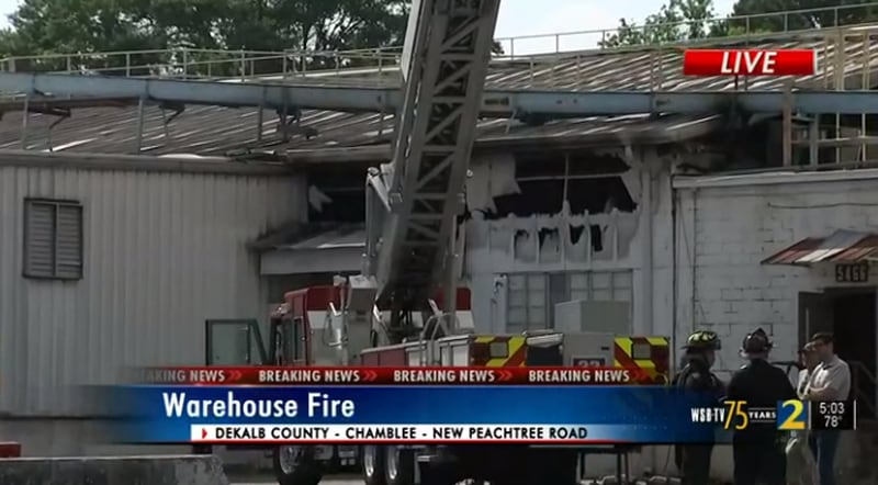 The siding of a former Chamblee feed mill was melted during a fire.