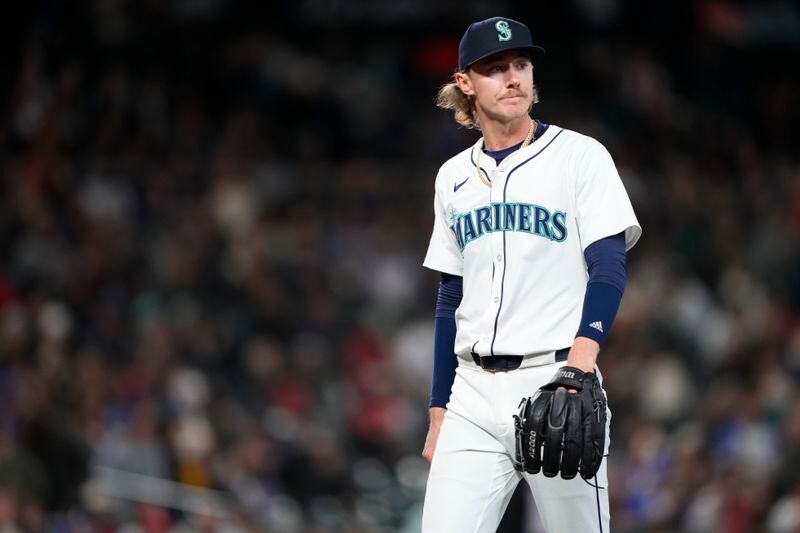 Seattle Mariners starter Bryce Miller walks to the dugout after pitching through the fifth inning of a baseball game against the Atlanta Braves, Monday, April 29, 2024, in Seattle. (AP Photo/Lindsey Wasson)