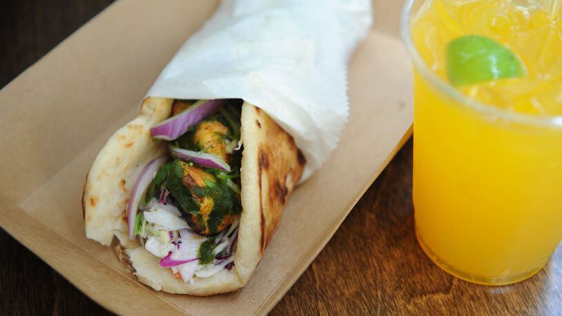 Chicken Tikka Roll with a Pineapple Turmeric Soda at Botiwalla. (Beckysteinphotography.com)