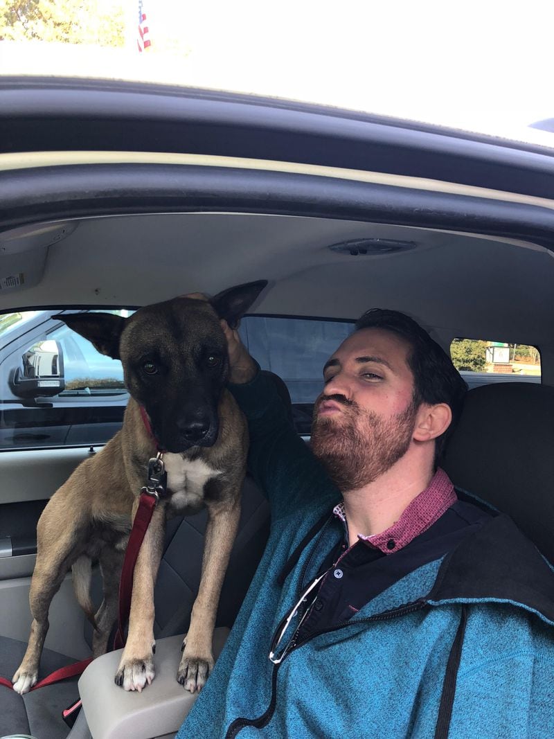 Turnbull and his new dog, Stallz, just before their first car ride together.