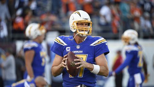 San Diego Chargers quarterback Philip Rivers (17) warms-up before an NFL football game against the Denver Broncos Thursday, Oct. 13, 2016, in San Diego. (AP Photo/Denis Poroy)