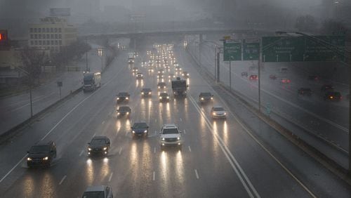 Traffic makes its way through Atlanta as rain showers blanket the area on Friday morning on Dec.28th, 2018. (Photo by Phil Skinner)