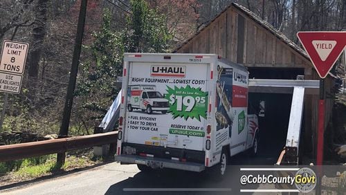 A U-haul truck crashed into the metal beam protecting Cobb's historic covered bridge on Concord Road.