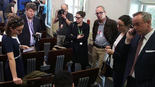 WASHINGTON, DC - FEBRUARY 24: Reporters in the Brady Briefing Room listen to a tape from a press gaggle by White House Press Secretary Sean Spicer, on February 24, 2017 in Washington, DC. The New York Times, Los Angeles Times, CNN and Politico were also excluded from the off camera gaggle. (Photo by Mark Wilson/Getty Images)