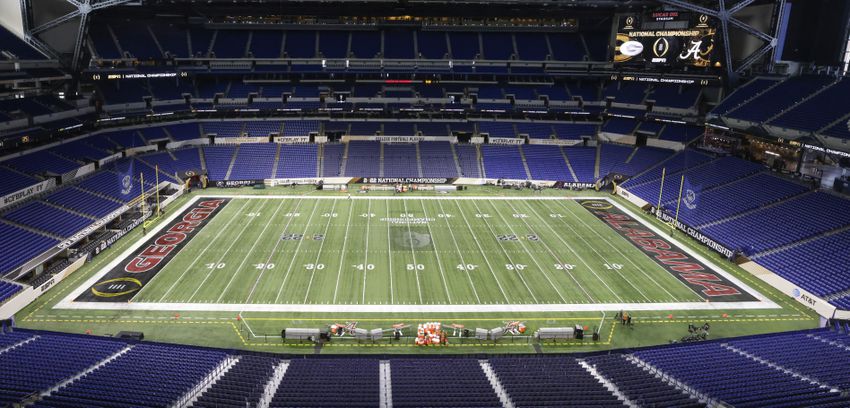 Except for the center logo, the field appears to be ready at the scene of the 2022 College Football Playoff National Championship  between the Georgia Bulldogs and the Alabama Crimson Tide at Lucas Oil Stadium in Indianapolis on Sunday, January 9, 2022.   Bob Andres / robert.andres@ajc.com