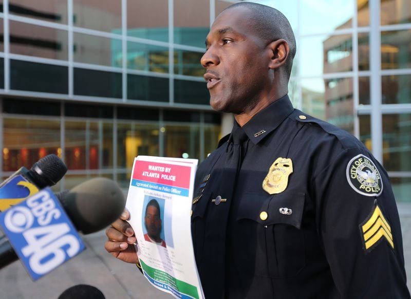 Atlanta Police Sgt. Warren Pickard holds a news conference Tuesday evening, Dec. 29, 2015 to announce that police were looking for Anthony Bernard Williams in connection with a police shooting that happened early Monday morning. (Ben Gray / bgray@ajc.com)