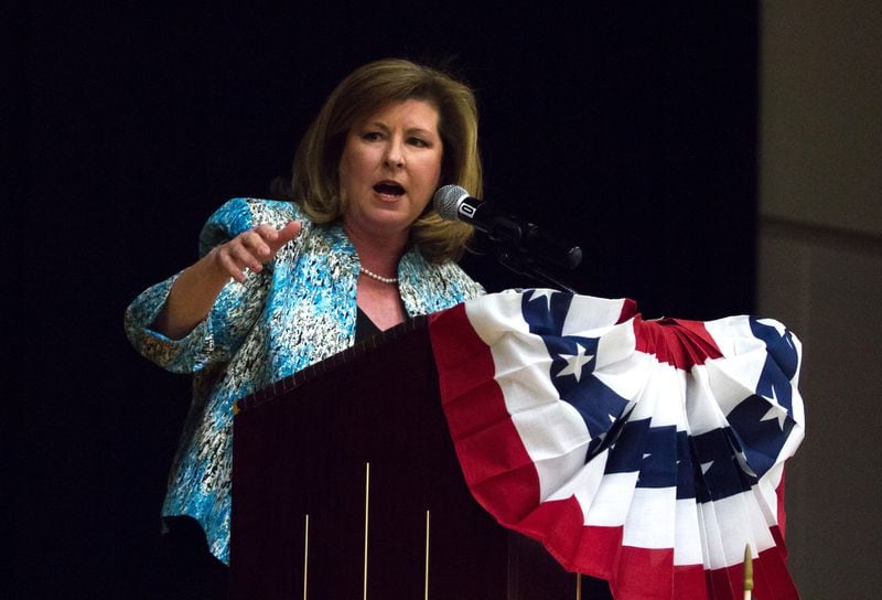 U.S. Rep. Karen Handel speaks last month at the 6th Congressional District BBQ Roundup in Roswell. Last year, she won a special election to become Georgia’s first GOP congresswoman. STEVE SCHAEFER / SPECIAL TO THE AJC