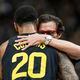 Utah Jazz forward John Collins (20) and Hawks head coach Quin Snyder embrace on the court during the first half Friday. It was Snyder's first time coaching back in Salt Lake City since departing as head coach of the Jazz. Collins, a former Hawks star, scored 18 in Utah's 124-122 victory. (AP Photo/Spenser Heaps)
