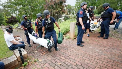(POLICE TRAINING) Paramedics from the Atlanta Police Department removed victims from a simulated active shooter exercise at the Oakland Cemetery on Thursday, May 18, 2023.
Miguel Martinez /miguel.martinezjimenez@ajc.com