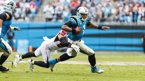 Carolina Panthers quarterback Cam Newton (1) runs with the ball against the Atlanta Falcons during an NFL game in Charlotte, N.C. on Sunday, Nov. 5, 2017. (Chris Keane/AP Images for Panini)