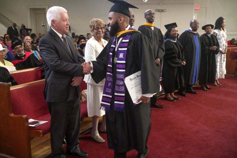 A graduate is congratulated after he received his diploma during the 2018 Morris Brown College commencement ceremony at the Big Bethel AME Church in Atlanta on May 19, 2018. The college currently has 42 students. STEVE SCHAEFER / SPECIAL TO THE AJC