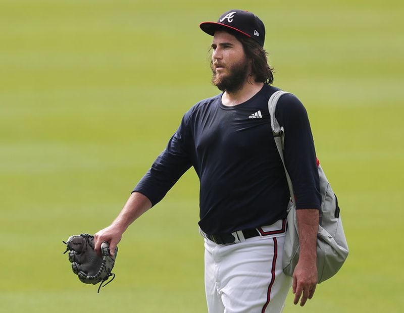 Braves pitcher Luke Jackson - sporting a healthy beard - says he has not shaved since spring camp was shut down for COVID-19, as he takes the field for the first workout of summer Friday, July 3, 2020, at Truist Park in Atlanta.