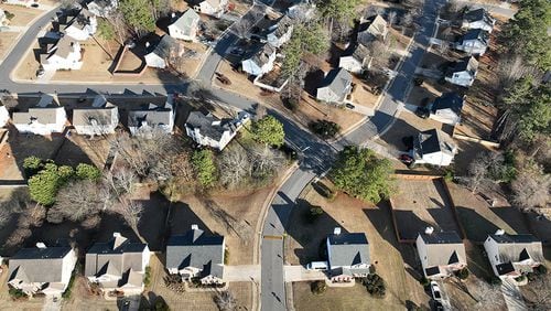Aerial view of Winslow at Eagles Landing neighborhood, where large number of homes are owned by investors, Thursday, Jan. 26, 2023, in McDonough. Two companies, Invitation Homes and Progress Residential, each own more than 10,000 homes in the metro Atlanta area as of, or near the end of, the 2nd quarter 2022. In fact, there are 11 companies with ties to private equity that own more than 1,000 homes, according to an AJC analysis. (Hyosub Shin / Hyosub.Shin@ajc.com)