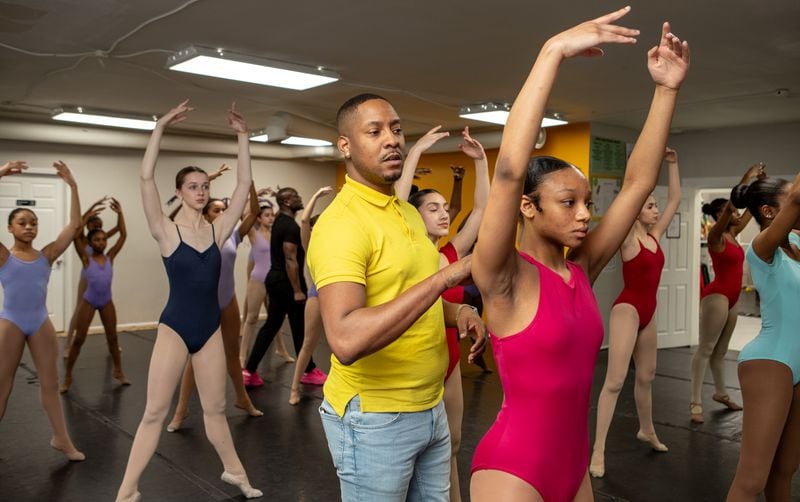 The Namari Dance Center in Sandy Springs is the home to approximately 50 dance students and is where owner and director Shervoski Moreland works to correct ballet postures Monday, Feb 26, 2024.  The center will travel to Africa for a collaboration performance in July 2025. (Jenni Girtman for the Atlanta Journal-Constitution)