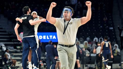 Georgia Tech basketball coach Josh Pastner celebrates their victory over Notre Dame Saturday, Feb. 6, 2021, at McCamish Pavilion in Atlanta. Tech won 82-80. (Hyosub Shin / Hyosub.Shin@ajc.com)