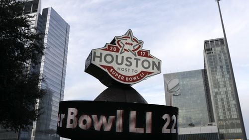 This Jan. 14, 2017 photo shows a countdown sign leading up to Super Bowl LI in Discovery Green park in downtown Houston. Super Bowl LI will be played Feb. 5 at NRG Stadium in Houston. (AP Photo/David J. Phillip)