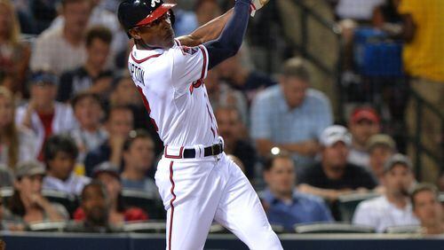 Atlanta Braves B.J. Upton watches his homerun shot in the 6th inning against the Milwaukee Brewers on Thursday May 22, 2014, at Turner Field in Atlanta. (Brant Sanderlin/Atlanta Journal-Constitution/MCT) The Braves' B.J. Upton is reaching base more and striking out less. Honest. (Brant Sanderlin/AJC)