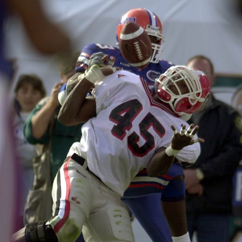 Georgia's Boss Bailey intercepts the ball in the end zone  in front of Florida intended receiver Ran Carthon Saturday, Oct. 27, 2001, in Jacksonville.