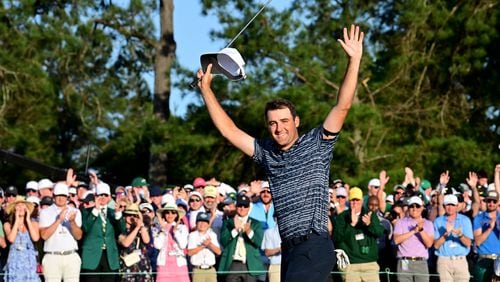 Scottie Scheffler reacts after winning the Masters golf tournament during the final round of the Masters at Augusta National Golf Club on Sunday, April 10, 2022, in Augusta. (Hyosub Shin / Hyosub.Shin@ajc.com)