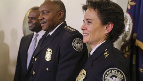 Left to right - Mayor Kasim Reed, APD Chief George Turner and APD Deputy Chief Erika Shields at a city hall press conference Thursday Shields was named Atlanta’s 24th chief of police Thursday, replacing George Turner who is retiring. JOHN SPINK /JSPINK@AJC.COM
