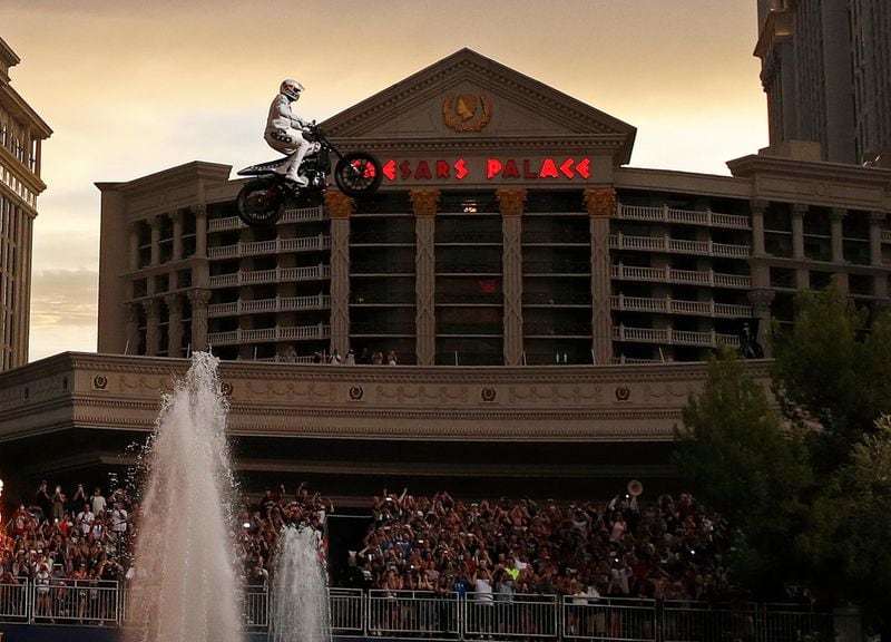 Travis Pastrana jumps the fountain at Caesars Palace on a motorcycle Sunday, July 8, 2018, in Las Vegas. Pastrana recreated three of Evel Knievel's iconic motorcycle jumps on Sunday, including the leap over the fountains of Caesars Palace that left Knievel with multiple fractures and a severe concussion.