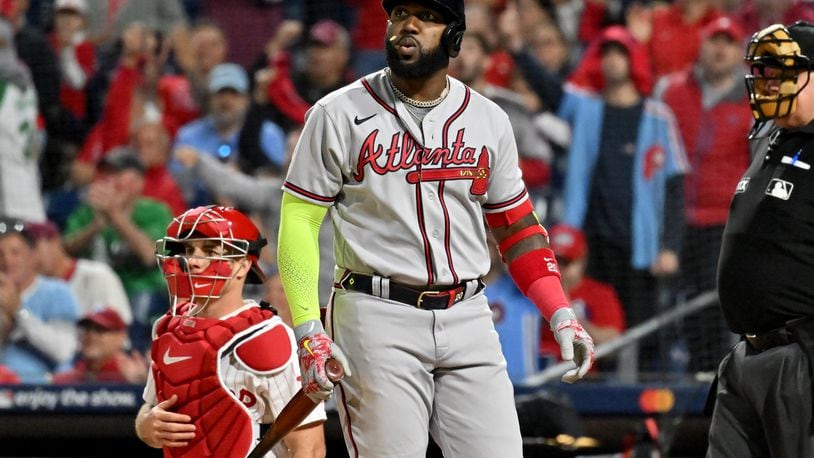 Atlanta Braves designated hitter Marcell Ozuna (20) strikes out against the Philadelphia Phillies during the ninth inning of game three of the National League Division Series at Citizens Bank Park in Philadelphia on Friday, October 14, 2022. (Hyosub Shin / Hyosub.Shin@ajc.com)