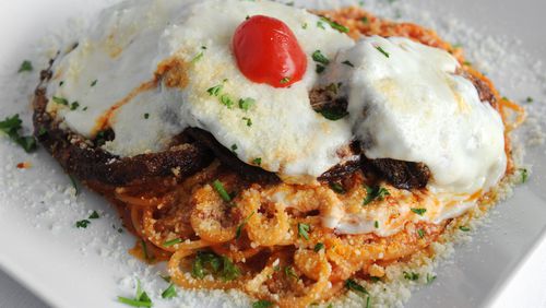 La Parmigiana- choice of eggplant, chicken or veal, served with spaghetti and marinara sauce at Mezza Luna. (BECKY STEIN PHOTOGRAPHY)