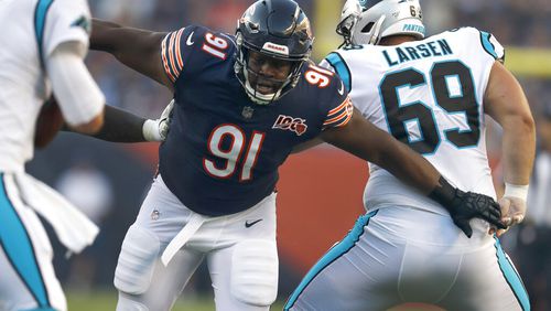FILE - Chicago Bears nose tackle Eddie Goldman breaks through the Carolina Panthers offensive line during the first half of an NFL preseason football game, Thursday, Aug. 8, 2019, in Chicago. The Atlanta Falcons acquired run-stopping help for the middle of their defensive line on Wednesday, July 6, 2022, by signing former Chicago Bears nose tackle Eddie Goldman to a one-year deal. (AP Photo/Amr Alfiky, File)