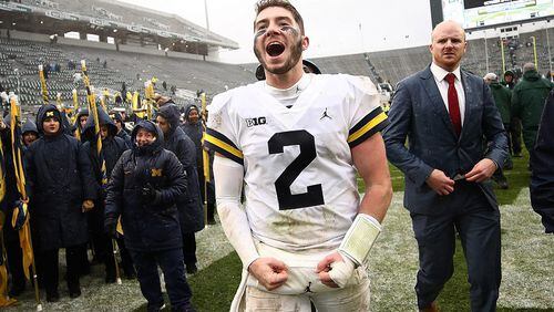 Shea Patterson of the Michigan Wolverines leaves the field after a 21-7 win over the Michigan State Spartans at Spartan Stadium on October 20, 2018 in East Lansing, Michigan. (Photo by Gregory Shamus/Getty Images)