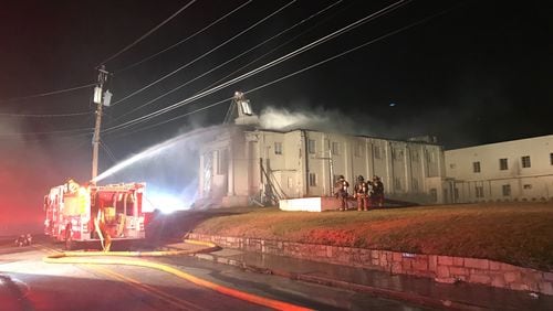 Atlanta fire crews are battling flames at Victory Baptist Church.
