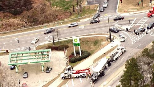 Authorities closed all southbound lanes of Cobb Parkway at Paces Mill Road while they investigated.
