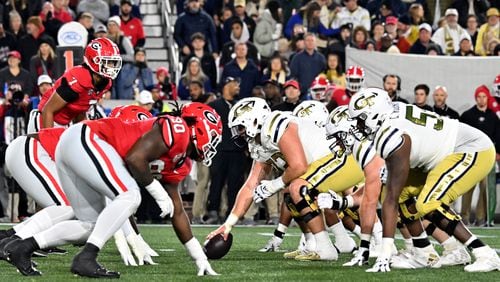 Georgia and Georgia Tech line up at the line of scrimmage during the first half of an NCAA college football game at Georgia Tech's Bobby Dodd Stadium, Saturday, November 25, 2023, in Atlanta. Georgia won 31-23 over Georgia Tech. (Hyosub Shin / Hyosub.Shin@ajc.com)
