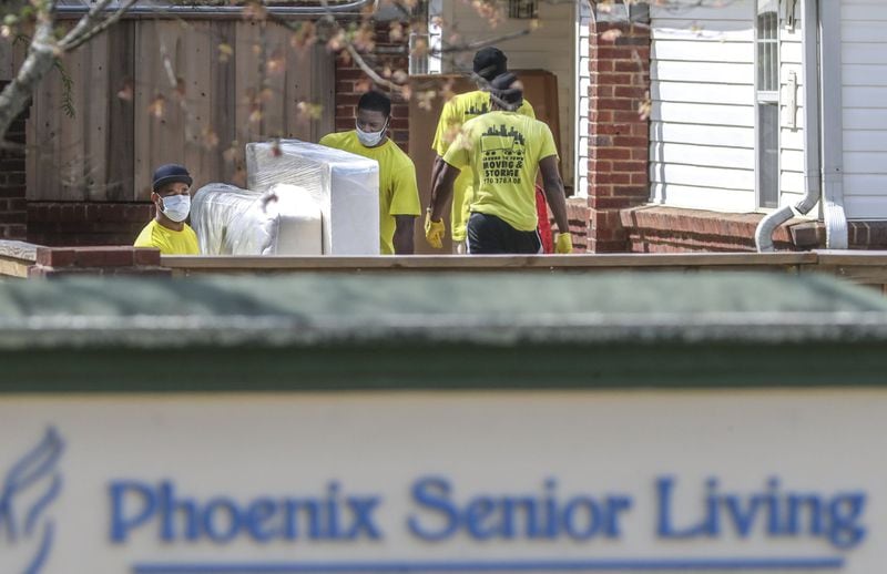 On Thursday, movers came to The Phoenix at Roswell. The company is preparing the facility to be a coronavirus care center. .JOHN SPINK/JSPINK@AJC.COM