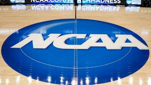 The NCAA logo is at center court at The Consol Energy Center in Pittsburgh. (AP Photo/Keith Srakocic, File)