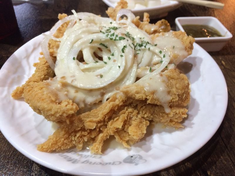 The “snow onion” chicken tenders at Choong Man Chicken in Duluth have a sweet, creamy, mayonnaise-based dressing, but you can take things up a notch. CONTRIBUTED BY WENDELL BROCK