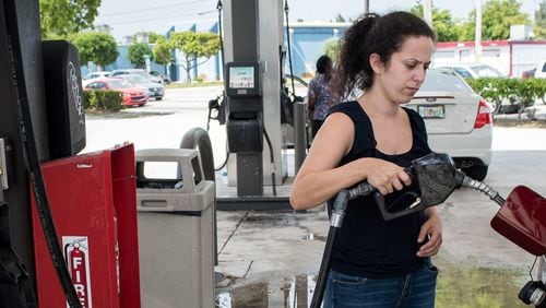 The price of gasoline has been dropping the past few weeks. That trajectory is likely to reverese direction before long. (Michael Ares / The Palm Beach Post)