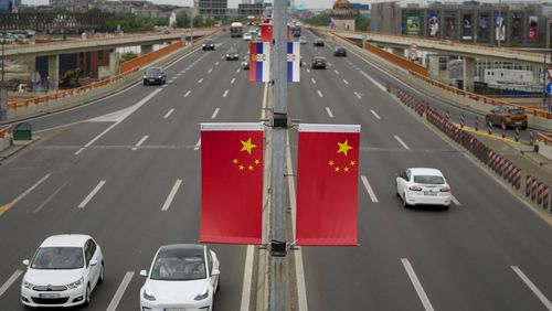Chinese and Serbian flags fly on lampposts, days before the visit of Chinese President Xi Jinping in Belgrade, Serbia, Wednesday, May 1, 2024. Xi will visit France, Serbia and Hungary this week as Beijing appears to seek a larger role in the conflict between Russia and Ukraine that has upended global political and economic security. (AP Photo/Darko Vojinovic)