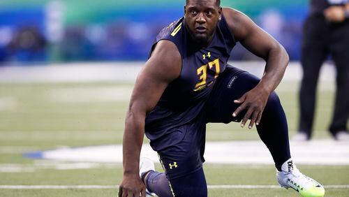 INDIANAPOLIS, IN - MARCH 03: Offensive lineman Cam Robinson of Alabama runs a drill during day three of the NFL Combine at Lucas Oil Stadium on March 3, 2017 in Indianapolis, Indiana. (Photo by Joe Robbins/Getty Images)