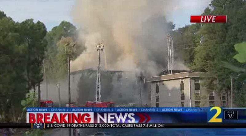 Flames could be seen shooting through the roof of the building.