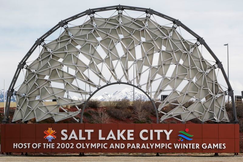 The iconic symbol of Salt Lake City's 2002 Winter Olympics greets travelers at the Salt Lake City International Airport Friday, Feb. 18, 2023, in Salt Lake City. Salt Lake City's enduring enthusiasm for hosting the Olympics will be on full display Wednesday, April 10, 2024, when members of the International Olympic Committee come to Utah for a site visit ahead of a formal announcement expected this July to name Salt Lake City the host for the 2034 Winter Olympics. (AP Photo/Rick Bowmer)