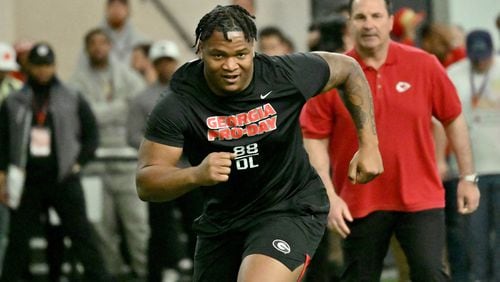 Georgia's defensive lineman Jalen Carter runs in front of coaches and scouts. (Hyosub Shin/The Atlanta Journal-Constitution/TNS)